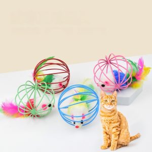 Adorable tabby cat with colorful toys in playful setting.