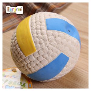 Vintage EETOYS Volleyball - Well-Loved Multicolored Ball on Wooden Floor.