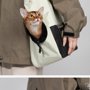 Stylish jacket with cat-friendly pockets for comfortable and convenient pet carrying.